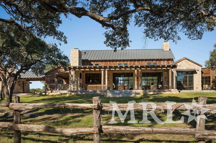 A photo of our antique barnboard, vintage rafter stock, corral board, and century-old hand-hewn beams that make up everything from the timber package and siding to the cabinetry and doors in the Glensprings Ranch project.