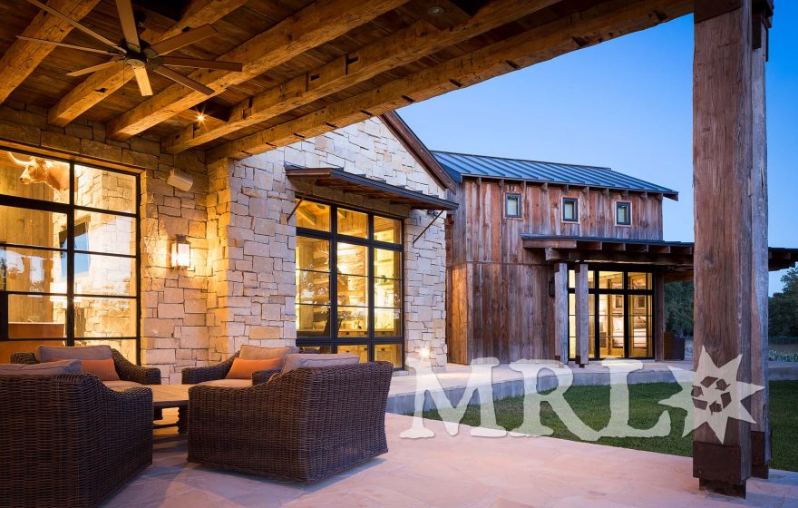 A photo of our antique barnboard, vintage rafter stock, corral board, and century-old hand-hewn beams that make up everything from the timber package and siding to the cabinetry and doors in the Glensprings Ranch project.