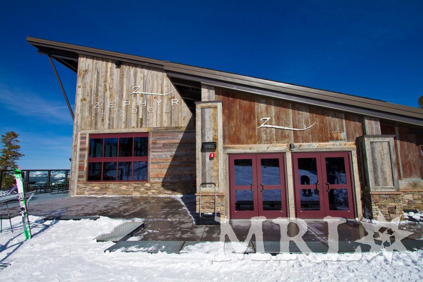 A photo of our reclaimed corral board and barn board siding and paneling on this Tahoe-based ski resort, “Zephyr Lodge”.