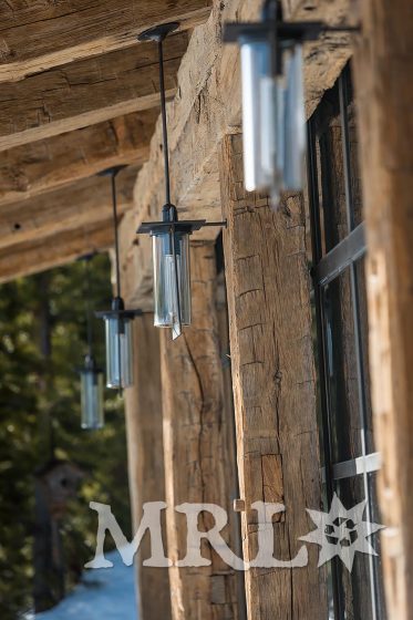 A photo showing reclaimed oak paneling and hand hewn timbers in the Camp Run-a-Muck project.