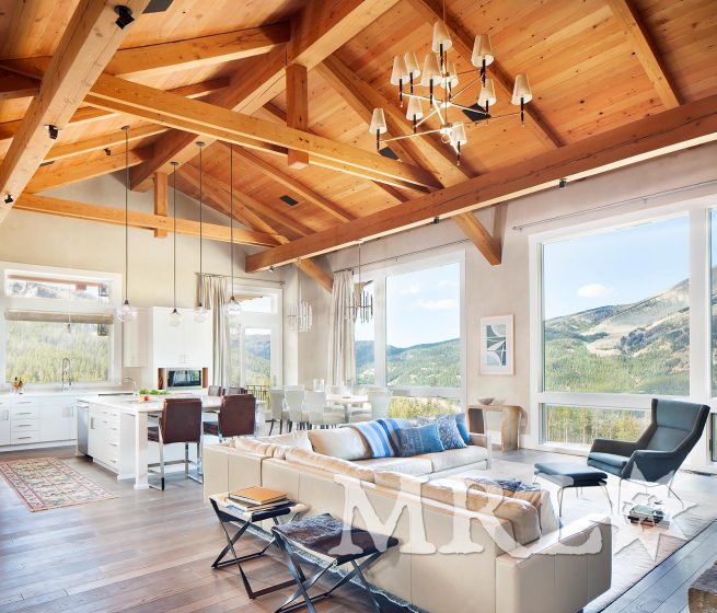 A photo of our Structural Stick (reclaimed, resawn Douglas fir) trusses, gable details, stair elements, and applied rafters along with re-sawn Douglas fir ceiling cladding throughout the Alpin project.