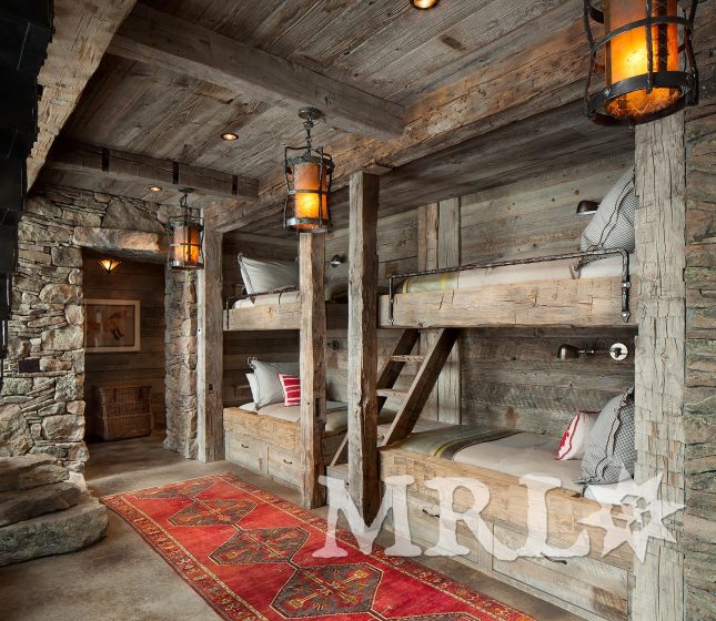 A photo of our reclaimed hand hewn beams and corral board featured throughout the Andesite Ridge project.