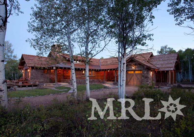 A photo of our reclaimed timber, rafter stock, barn board, corral board, and hand hewn beams featured in The Aspens project.