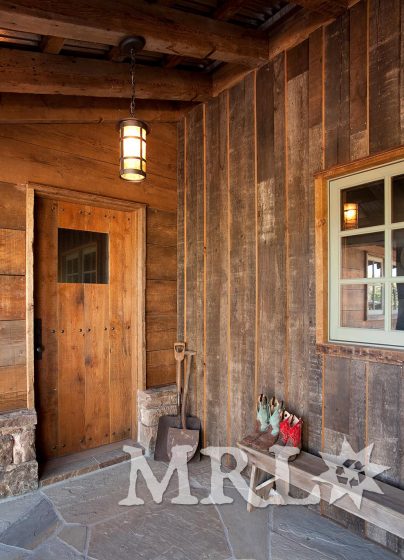 A photo of our reclaimed timber, rafter stock, barn board, corral board, and hand hewn beams featured in The Aspens project.