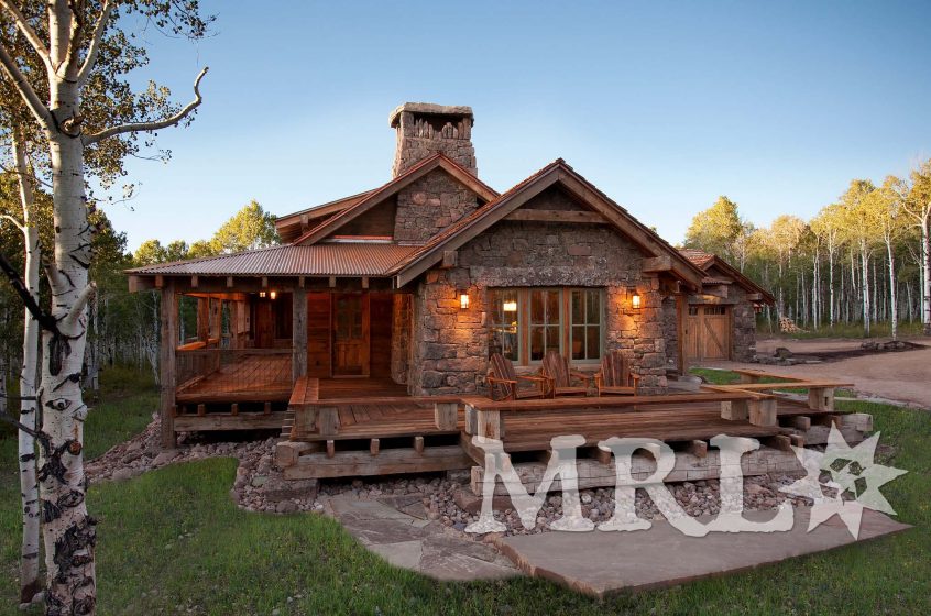 A photo of our reclaimed timber, rafter stock, barn board, corral board, and hand hewn beams featured in The Aspens project.