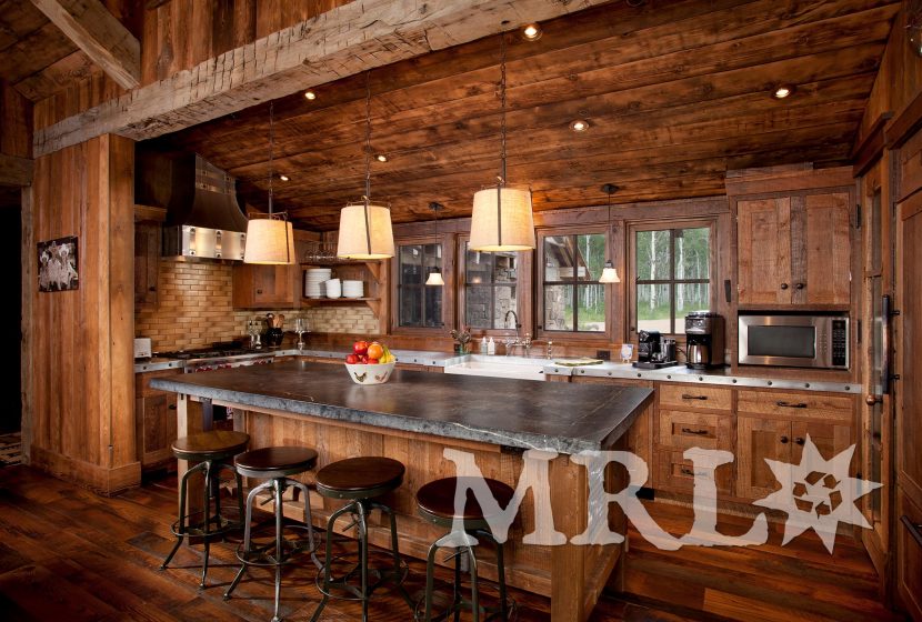 A photo of our reclaimed timber, rafter stock, barn board, corral board, and hand hewn beams featured in The Aspens project.