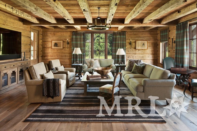 A photo of MRL’s reclaimed hand-hewn timbers and siding, oak wall paneling, trim, and flooring and rafter stock clad ceilings in the Charlie Mountain project.