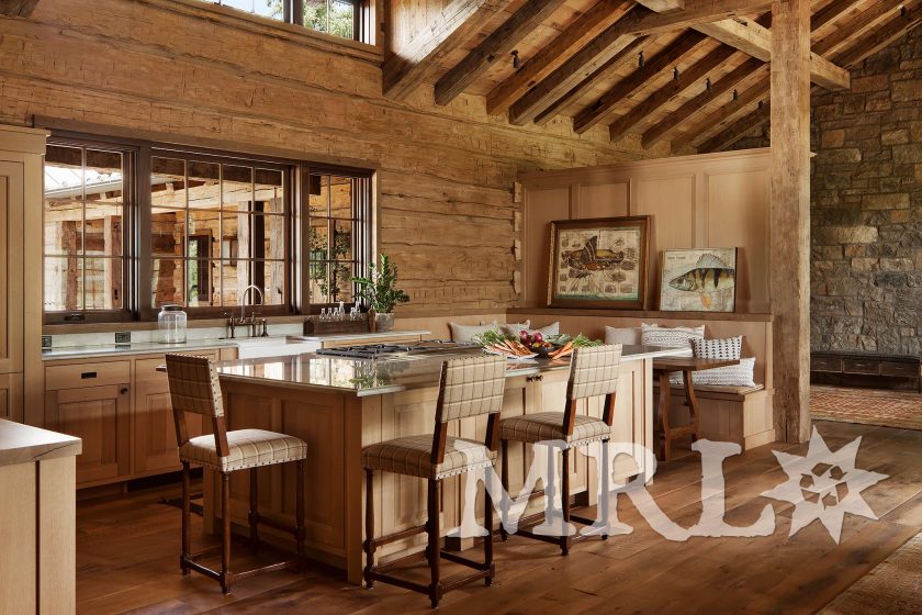 A photo of MRL’s reclaimed hand-hewn timbers and siding, oak wall paneling, trim, and flooring and rafter stock clad ceilings in the Charlie Mountain project.