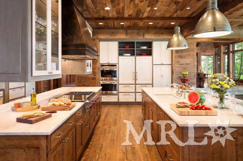 A photo showcasing our reclaimed corral board, barn board, hand-hewn beams and antique Douglas fir timbers in the Lake Country Retreat project.