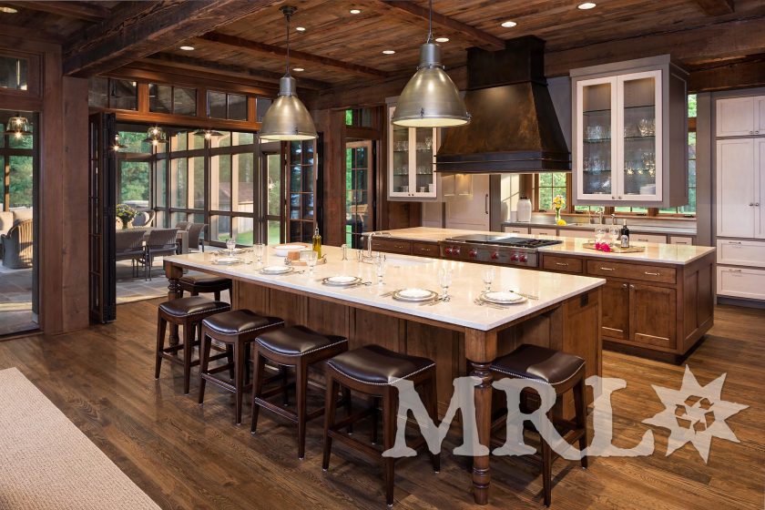 A photo showcasing our reclaimed corral board, barn board, hand-hewn beams and antique Douglas fir timbers in the Lake Country Retreat project.